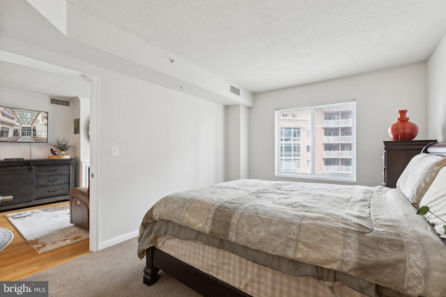 bedroom with a textured ceiling