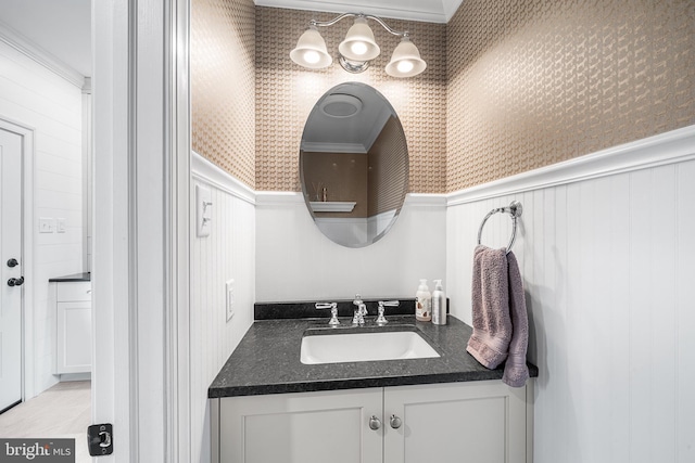 bathroom featuring wainscoting and vanity