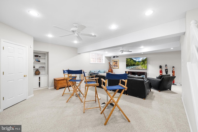 living room with recessed lighting, light carpet, ceiling fan, and baseboards