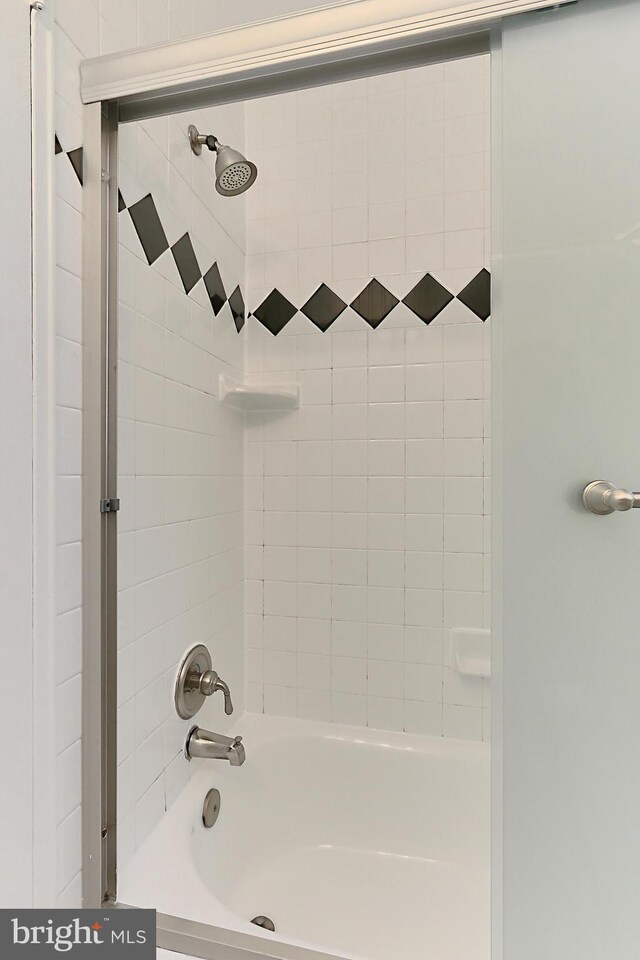 full bathroom with shower / tub combination