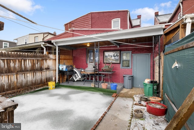 back of house with a patio area