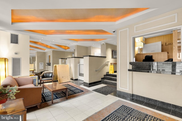 building lobby with visible vents and stairway