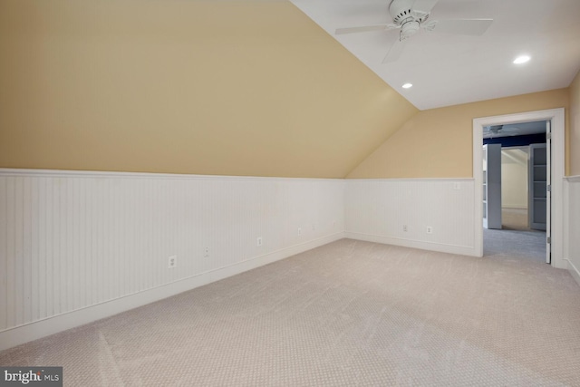 bonus room with lofted ceiling, wainscoting, carpet flooring, and recessed lighting