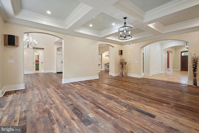 unfurnished living room with arched walkways, beamed ceiling, and wood-type flooring