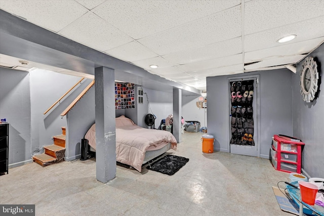 bedroom featuring a drop ceiling