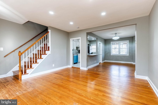 unfurnished living room featuring light hardwood / wood-style flooring