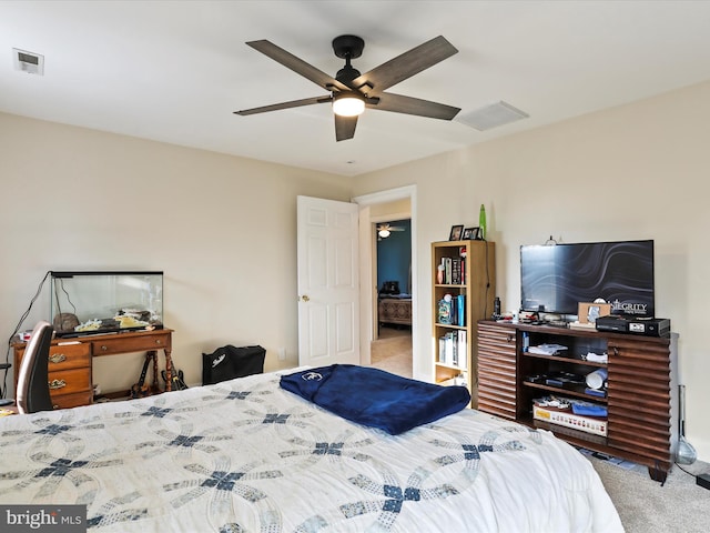 carpeted bedroom featuring ceiling fan