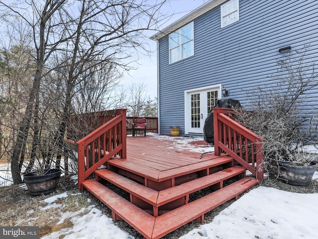 view of snow covered deck