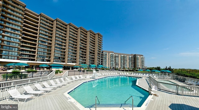 view of pool featuring a patio