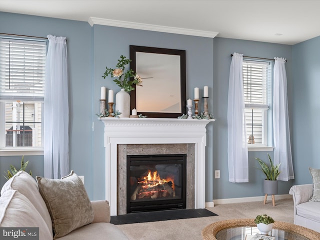 living room featuring ornamental molding and carpet