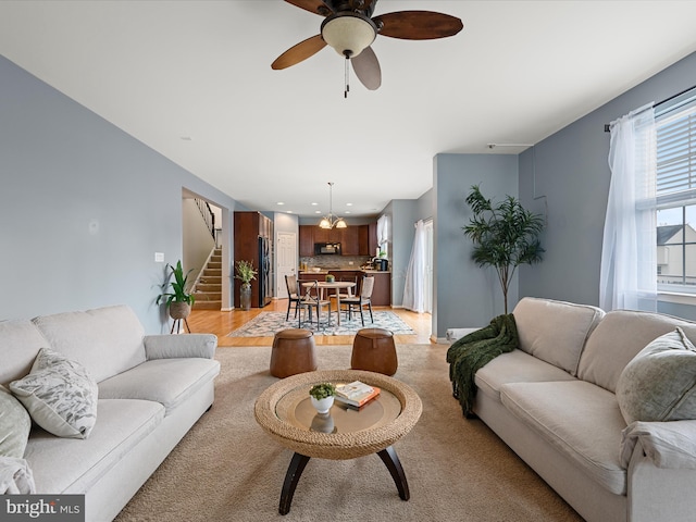 living room featuring ceiling fan