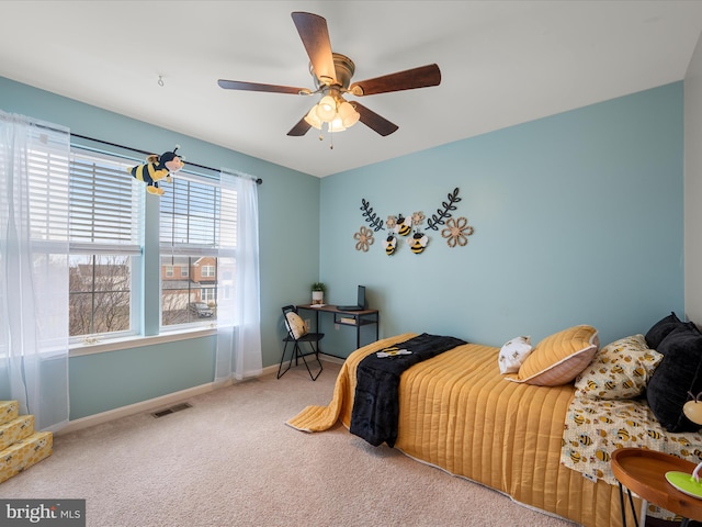 bedroom with ceiling fan and carpet