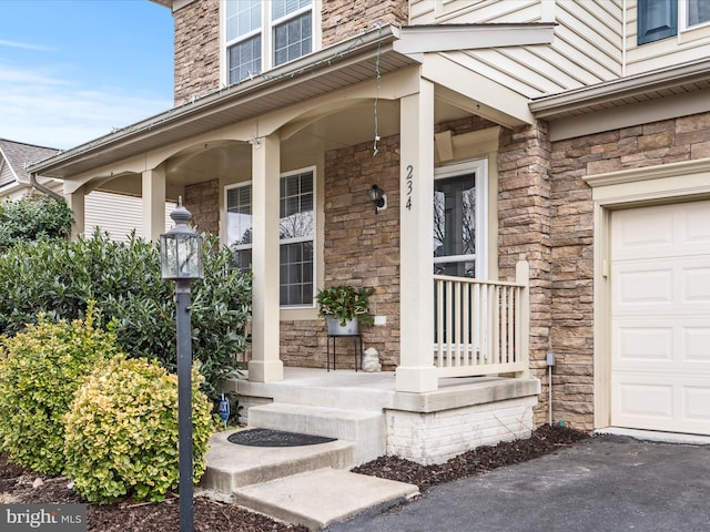 entrance to property with covered porch