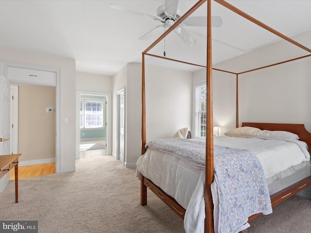 bedroom featuring ceiling fan and carpet flooring