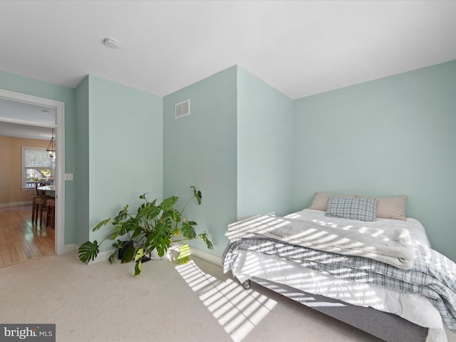 bedroom featuring carpet