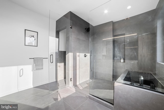 bathroom featuring tile patterned floors and walk in shower