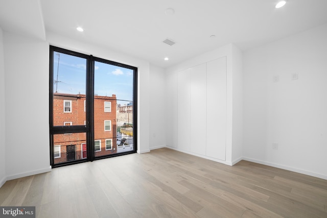 empty room featuring light hardwood / wood-style flooring