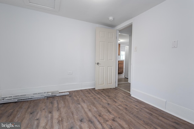 empty room featuring hardwood / wood-style floors