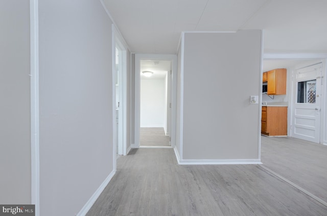 hall featuring light wood-type flooring