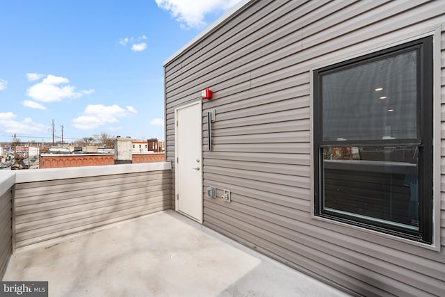 view of patio / terrace with a balcony