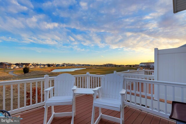 20868 Brunswick Ln, Millsboro, DE 19966 - deck at dusk featuring a water view