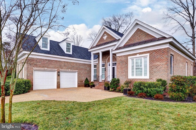 view of front of house featuring a garage and a front yard