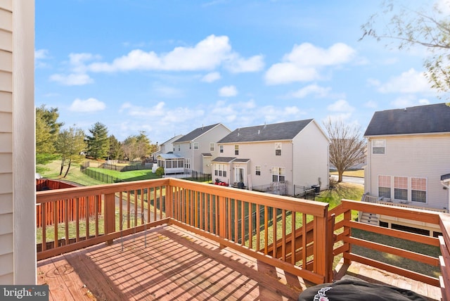 deck featuring a lawn