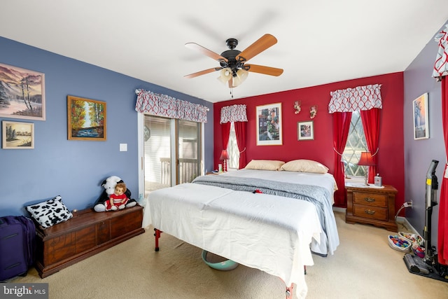 bedroom with a ceiling fan and carpet floors