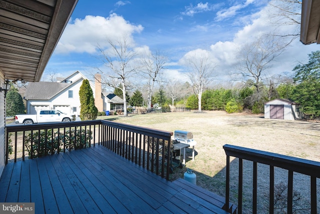 deck featuring an outbuilding and a shed