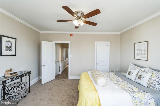 bedroom featuring light carpet, crown molding, and ceiling fan