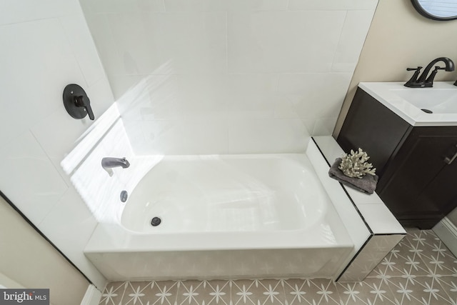 bathroom featuring vanity and a bathing tub