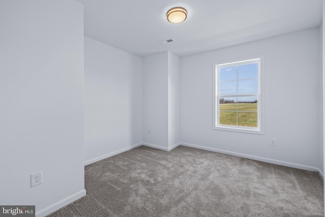 unfurnished room with carpet flooring