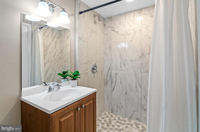 bathroom featuring vanity and a shower with curtain