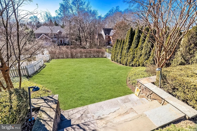 view of yard with fence