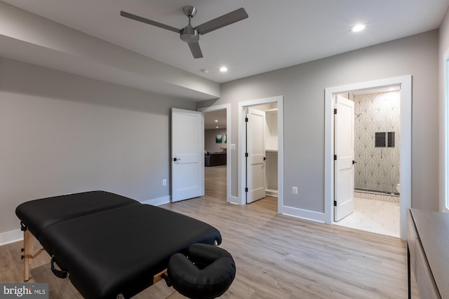 interior space featuring ceiling fan and light wood-type flooring