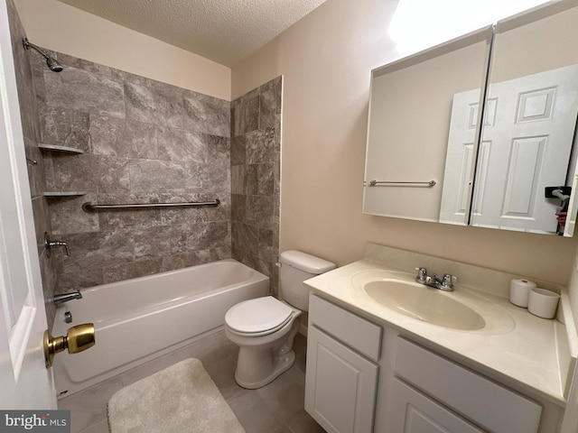 full bathroom with tile patterned flooring, vanity, a textured ceiling, toilet, and tiled shower / bath