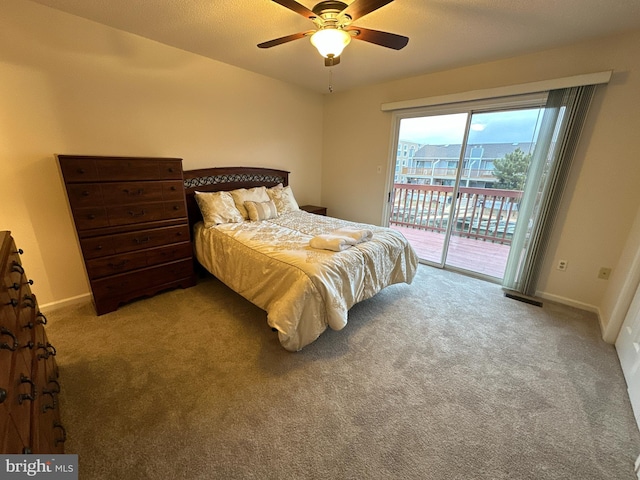 carpeted bedroom with access to exterior and ceiling fan