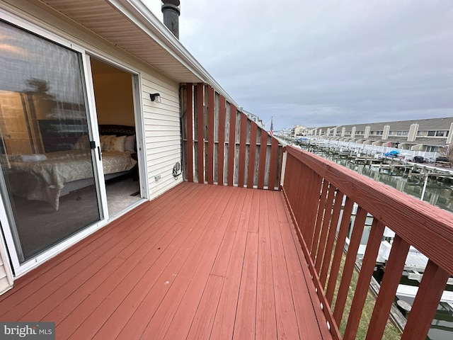 wooden terrace with a water view