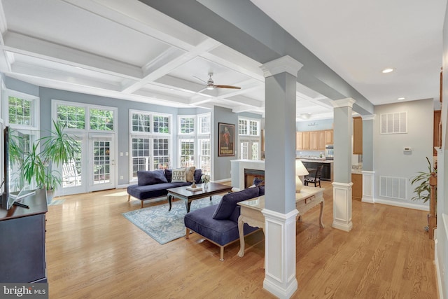 living room with a ceiling fan, ornate columns, visible vents, and coffered ceiling
