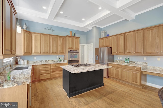 kitchen with a sink, stainless steel appliances, beamed ceiling, coffered ceiling, and light stone countertops