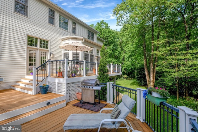 wooden terrace with grilling area