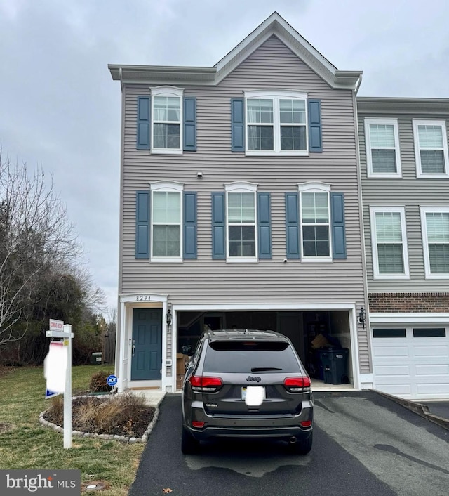 view of property featuring a garage