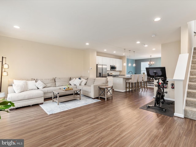 living room with dark hardwood / wood-style flooring