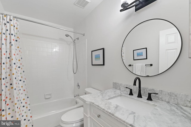 bathroom featuring toilet, shower / bathtub combination with curtain, visible vents, and vanity