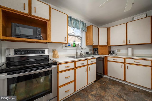 kitchen with white cabinetry, sink, and black appliances