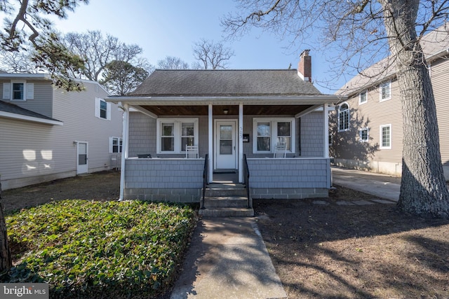 bungalow-style home with covered porch