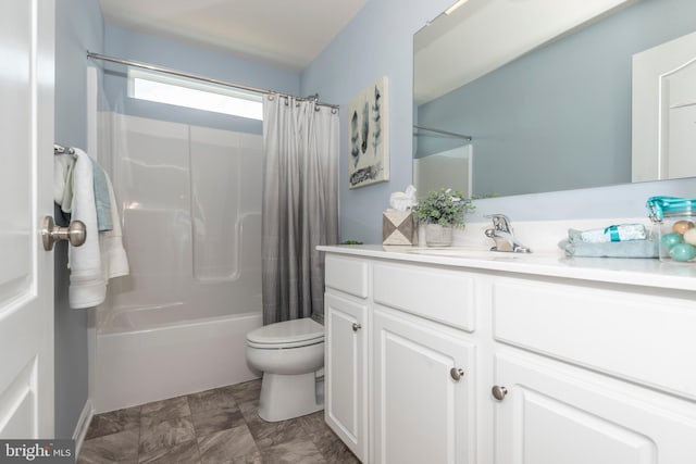 full bathroom featuring vanity, shower / tub combo with curtain, and toilet