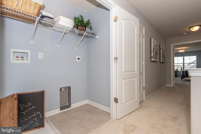 clothes washing area with hookup for an electric dryer, washer hookup, and light carpet