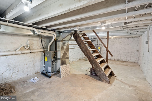 basement featuring heating unit