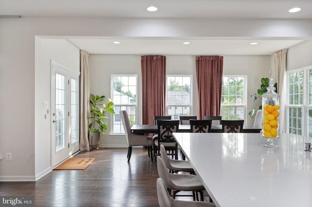 dining area featuring dark hardwood / wood-style floors